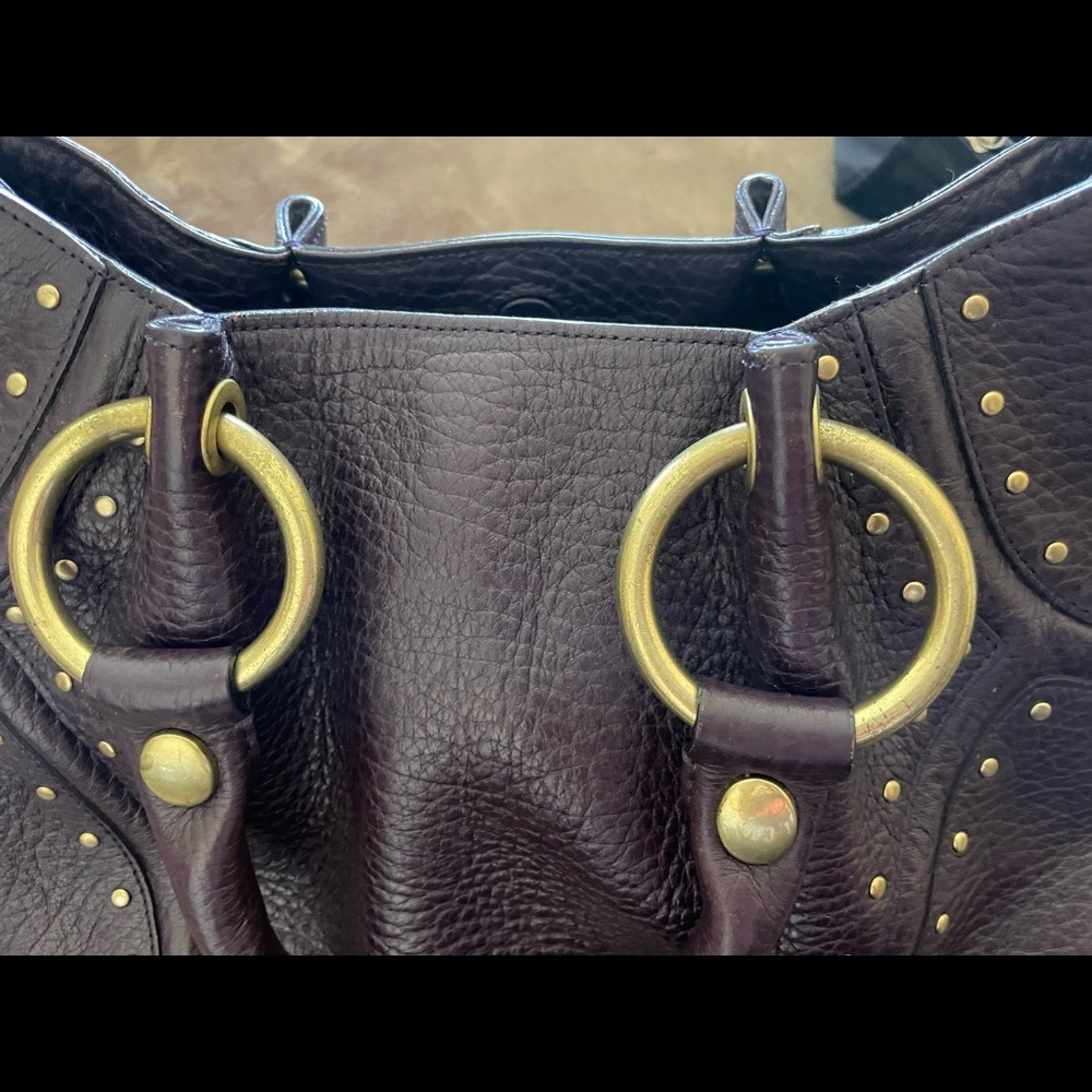 Kenneth Cole Purple Thick
Pebble Leather Studs Satchel Handbag
Purse PRE-OWNED - Picture 6 of 11